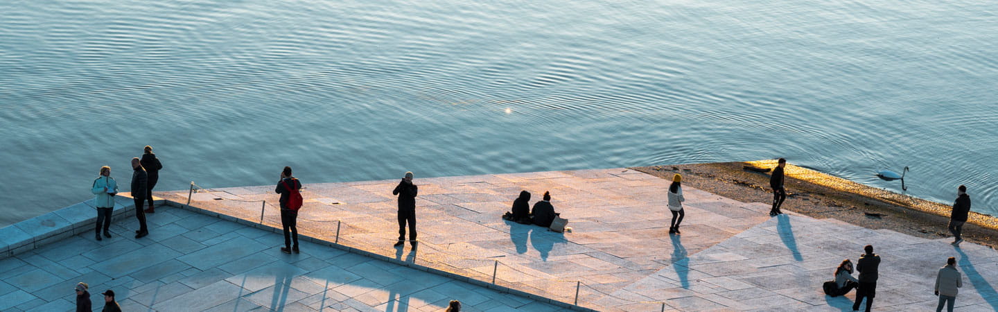 People across the river front