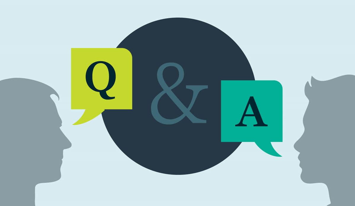 Two participants involved in a question-and-answer discussion.