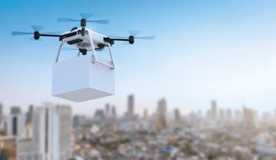 Drone flying over city