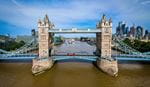 Aerial drone view of London Bridge spanning the River Thames from above