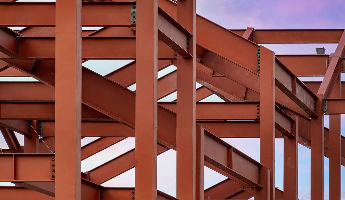 Steel beams forming a structural framework of a building under construction