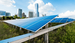 Solar panels on elevated structures overlook a city skyline