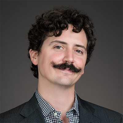 Person smiling for a portrait