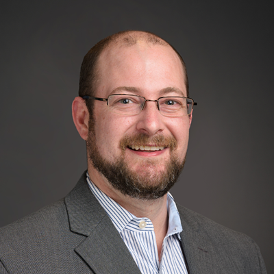 Person smiling for a portrait