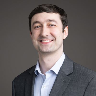 Person smiling for a portrait